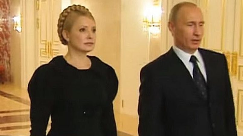 Юлия Тимошенко и Владимир Путин. Эти кадры 8-летней давности использовали в новогоднем обращении президента Украины. Фото: стоп-кадр