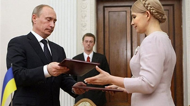 Юлия Тимошенко и Владимир Путин на подписании газовых контрактов в 2009 году / Фото: 24 Канал
