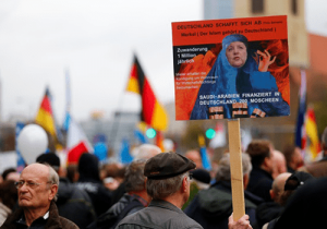 Опрос - 52% немцев недовольны политикой Меркель по мигрантам