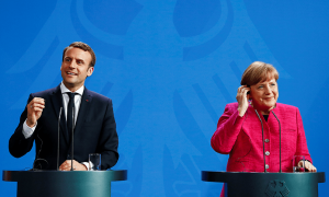 Канцлер ФРГ Ангела Меркель и новый президент Франции Эммануэль Макрон