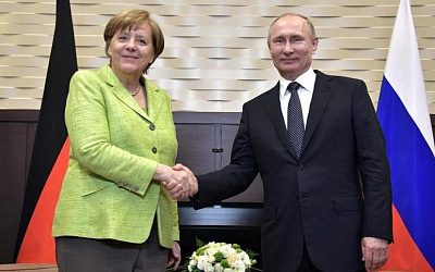 Путин и Меркель обсудили закрепление особого статуса Донбасса в украинском законодательстве