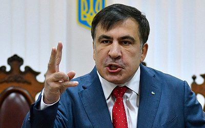 Саакашвили призвал Меркель и ЕС вместе бороться с Порошенко